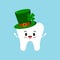 St Patrick day happy tooth in green leprechaun hat.