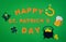 St. Patrick\\\'s Day. Banner design on green background with HAPPY ST. PATRICKS DAY and typical decorations. Copy space