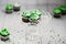St. Patrick`s Day chocolate cupcakes with green shamrock candies
