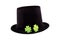 St. Patrick`s Day pattern black hat on the fields lies a pair of green clovers lies on a white isolated background