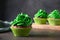 St. Patrick's Day tasty cupcakes with green whipped cream.