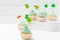 St. Patrick`s Day theme colorful horizontal banner. Cupcakes decorated with green buttercream and craft felt decorations in form