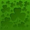 St Patricks day background with lucky green clover leaves. Vector illustration.