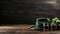 St. Patricks Day Composition with Beer Glass and Green Hat on Wood Background in Pub