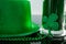 St Patricks Day green beer with shamrock, leprechaun hat and bead