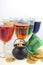 St Patricks Day party rainbow color drinks - vertical with hat and pot of gold