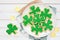 St Patricks Day shamrock cookies. Top down view table scene.