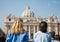 St Peter Cathedral external view with two young people