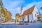 St. Peter`s Chapel on Kapellplatz with colorful Fritschi Fountain in Lucerne, Switzerland