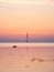 St. Petersburg, Peterhof, the coast of the Gulf of Finland at dawn in summer. View of the Lakhta center. Pink lilac orange dawn sk