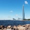 St. Petersburg, Russia - AUGUST 7, 2020: The rocky shore of the Baltic sea and the Lakhta center tower in the Primorsky