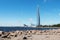 St. Petersburg, Russia - AUGUST 7, 2020: The rocky shore of the Baltic sea and the Lakhta center tower in the Primorsky