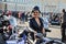 ST PETERSBURG, RUSSIA-September 26, 2020: happy biker woman on the rear seat of custom trike. Motorcyclists on their  motorcycles