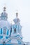 St. Petersburg Russian Federation 01/07/2017. Smolny Cathedral blue and white with snow-covered dome vertical photo