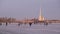 St. Petersburg in the winter. People walk on the ice of the Neva River.