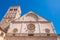 The St. Rufino cathedral in Assisi, Italy, in a summer sunny day