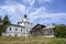 St. Sergius Church and an old wooden building on the territory of the St. John the Baptist Monastery in Sviyazhsk, Russia