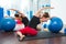 Stability ball in women Pilates class rear view