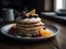 Stack of American Pancakes with fruits syrup and honey