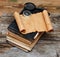 Stack of antique books with compass