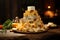 Stack of assorted cheese on a wooden board