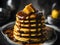 A stack of banana pancakes drizzled with honey