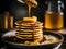 A stack of banana pancakes drizzled with honey