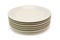 Stack of beige dinner plates