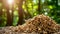 Stack of biomass wood pellets and firewood pile on blurred background with copy space for text