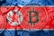 Stack of Bitcoin North Korea flag. Bitcoin cryptocurrencies concept. BTC background.