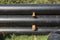 Stack of black pipes