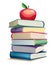 Stack of books with apple