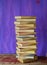 Stack of books on grungy background