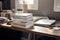 stack of books and journals on home office desk