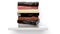 Stack of books with various subjects on wall shelf