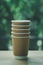 Stack of brown disposable coffee cup