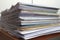 stack of business documents, each neatly aligned and labeled