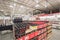 Stack of cardboard boxes with variety of wine and champagne display at Costco Wholesale store in USA