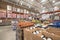 Stack of cardboard boxes with variety of wine and champagne display at Costco Wholesale store in USA