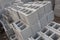 Stack of cement blocks at the construction site. cinder blocks background.