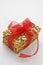 Stack Cereal cookies tied with red ribbon on a white wooden table. Rustic style. Selective focus