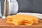 Stack of cheddar cheese slices