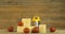 Stack cheese cubes and chery tomatoes with miniature grater on a wood kitchen table