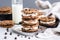 a stack of chocolate chip ice cream sandwiches on a silver tray