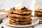 stack of chocolate chip pancakes with melting butter
