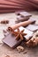 Stack of chocolate cracked pieces with cinnamon, anise star