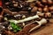 Stack of chocolate slices with mint leaf on a wooden table.Assortment of fine chocolates in white, dark, and milk chocolate. Sweet