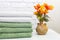 stack clean bath towels colorful cotton terry textile in bathroom white brick background