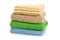 Stack of clean coloful  soft towels on white background