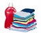 Stack of clothes and detergent bottle, fresh laundry textile